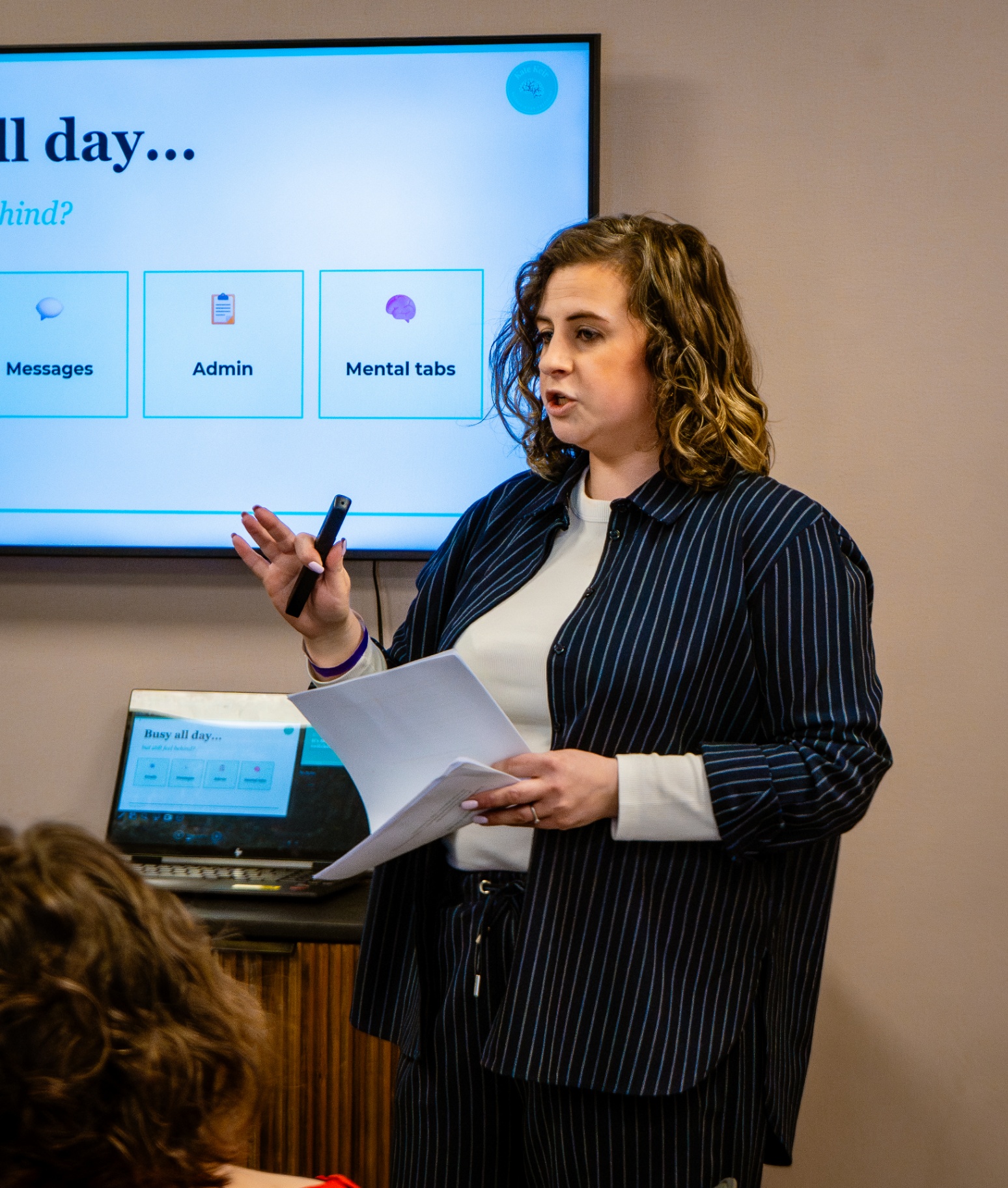 Kate Keir speaking at a seminar about neurodivergent business productivity